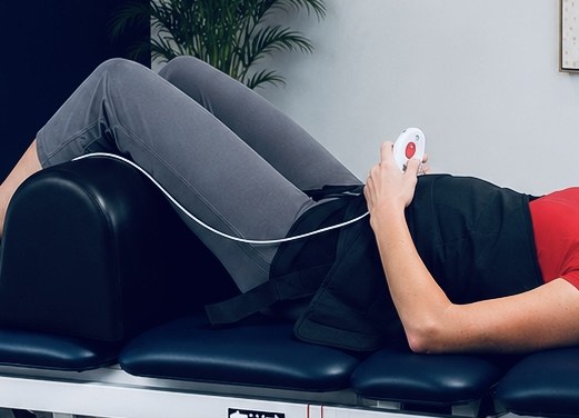 Lumbar spinal decompression treatment at Texas Functional Health Centers in Dallas, TX