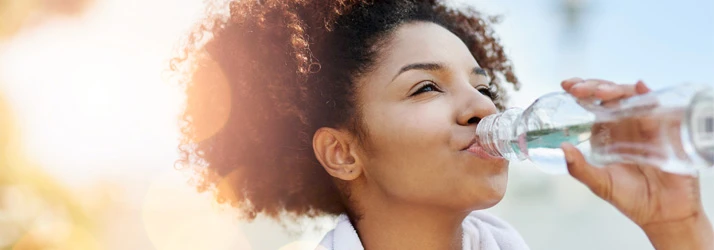 Chiropractic Dallas TX Woman Drinking Water