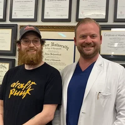 Chiropractor Dallas TX Adam Bohnenblust With Brandon D.